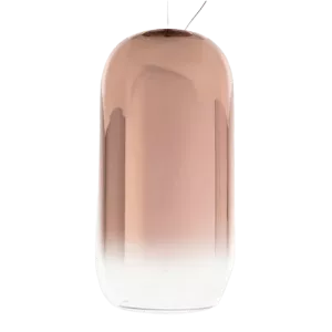 Darc — Un luminaire design en forme de cylindre transparent avec un verre teinté rose pâle et une base blanche, suspendu sur un fond noir.