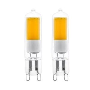 Darc — Deux ampoules LED de type GU10, allumées avec une lumière jaune chaude, montées sur des culots métalliques, fond noir contrasté