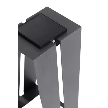 Darc — Un meuble de rangement gris clair en forme de cube, avec une étagère supérieure accueillant un objet noir et une étagère inférieure vide, dans
