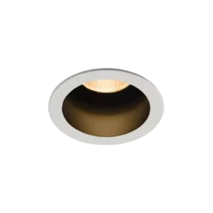 Darc — Un luminaire encastré de forme ovale, bordé d’un cadre blanc légèrement dentelé, diffusant une lumière douce et chaude depuis son centre.