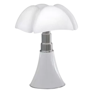 Darc — Lampe design en forme de champignon blanc avec un abat-jour en deux parties et une base élancée, posée sur un fond noir.