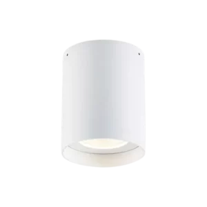 Darc — Applique murale de forme cylindrique en blanc, fixée au mur avec une lumière douce et diffuse émise depuis le bas, créant un éclairage ambiant