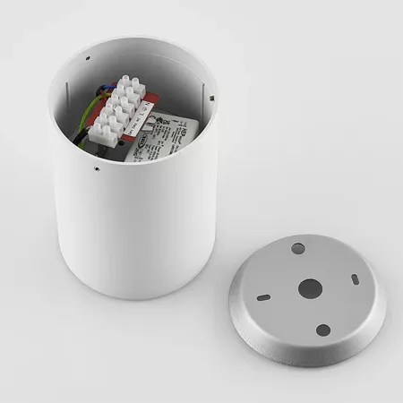 Darc — Image d’un boîtier cylindrique blanc ouvert montrant à l’intérieur une carte électronique avec plusieurs connecteurs blancs et fils colorés, ac