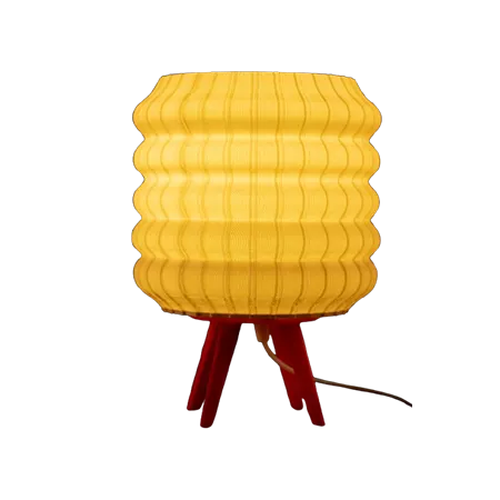 Darc — Luminaire jaune en forme de nid d'abeille posé sur un support rouge en forme de trépied, avec une texture hexagonale distinctive
